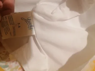 Vestido niña floral en coral.