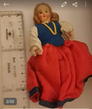 Muñeca antigua casa de muñecas