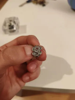 Pendientes Símbolo Dólar con Brillantes