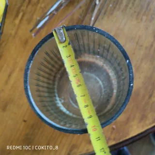 Jarrón de cristal verde acanalado