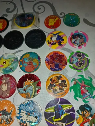 Tazos Digimon y Pokémon