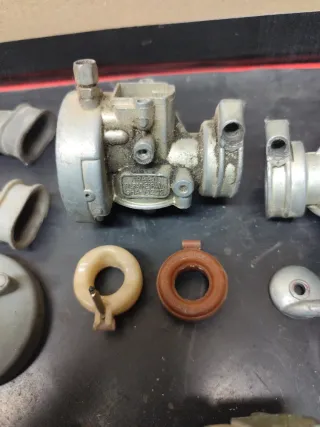 Carburador y caja de láminas Vespino