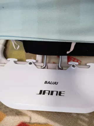 Hamaca para bebé con sonajero de madera