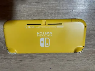 Nintendo Switch Lite Amarillo + Juego