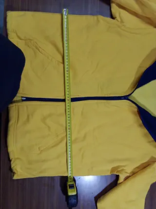 Sudadera con cremallera amarilla y azul