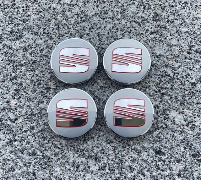 Tapabujes Seat 56mm Plata Nuevos (4 uds)