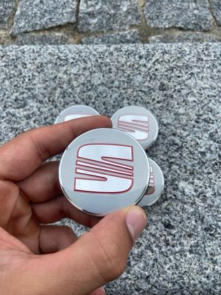 Tapabujes Seat 56mm Plata Nuevos (4 uds)