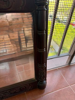 Espejo de madera tallada