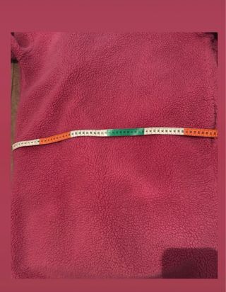 Abrigo rosa borreguito overside es bastante amplio