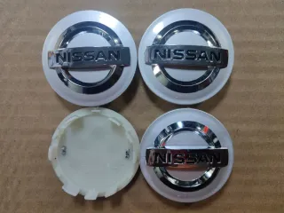 Tapabujes Nissan 54mm centro rueda llanta logo