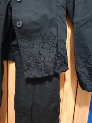 Traje negro chaqueta y pantalón