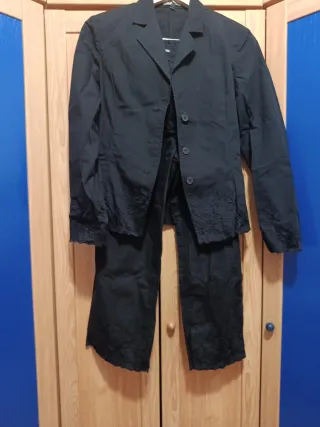 Traje negro chaqueta y pantalón