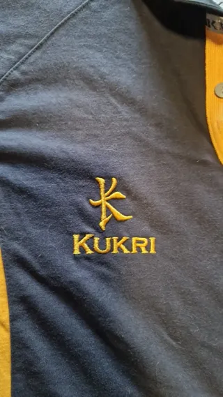 Polo Rugby KUKRI Azul y Amarillo
