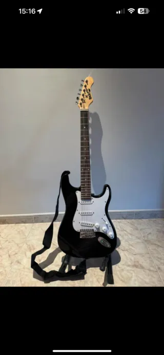 Guitarra Eléctrica Negra y Blanca