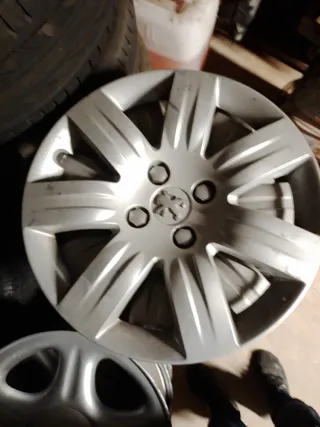 3 Tapacubos Peugeot métrica 16