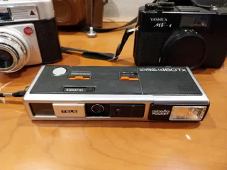 Lote 3  Cámaras fotos Minolta y Yashica y werlisa