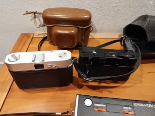 Lote 3  Cámaras fotos Minolta y Yashica y werlisa