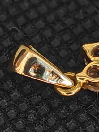 Colgante oro 18k rosetón circonitas. 051-03-00586