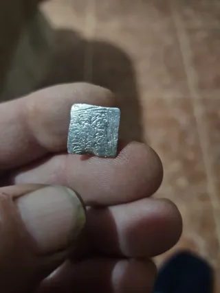 Moneda antigua de plata