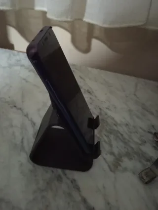 Soporte móvil gato negro