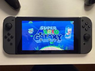 Nintendo Switch + 2 Mandos Pro + Juegos