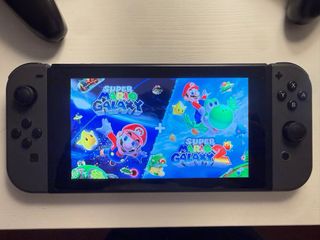Nintendo Switch + 2 Mandos Pro + Juegos