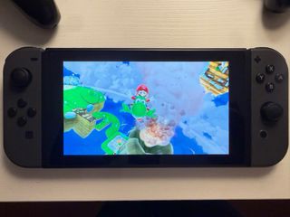 Nintendo Switch + 2 Mandos Pro + Juegos