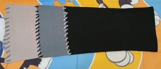 Sciarpa in lana nera, grigia e marroncina