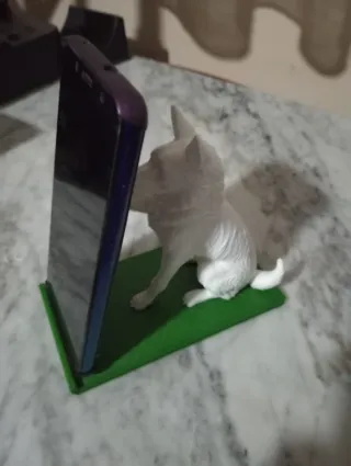 Figura perro blanco soporte móvil