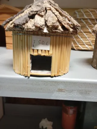 Casita de pájaro decorativa