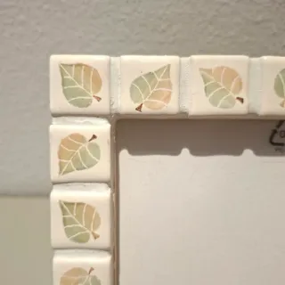 Cornicetta portafoto artigianale foglie