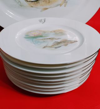 Vajilla Limoges de porcelana con peces