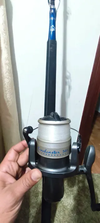Caña de pescar con carrete