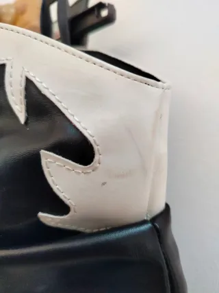 Botas altas vaqueras negras y blancas