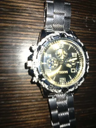 Reloj de hombre plateado con esfera azul