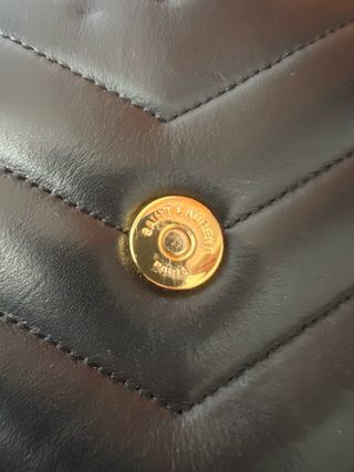Bolso Saint Laurent Negro y Dorado con factura