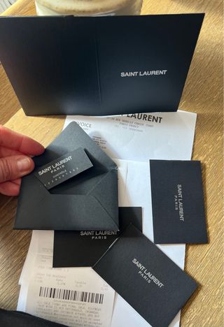 Bolso Saint Laurent Negro y Dorado con factura