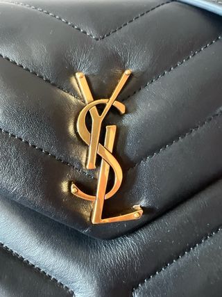Bolso Saint Laurent Negro y Dorado con factura