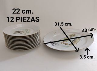 Vajilla de porcelana con peces y monograma