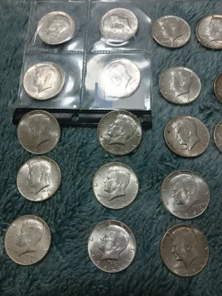 10 monedas de  medios dolares de plata 900 año1964