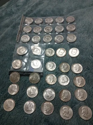 10 monedas de  medios dolares de plata 900 año1964