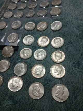 10 monedas de  medios dolares de plata 900 año1964