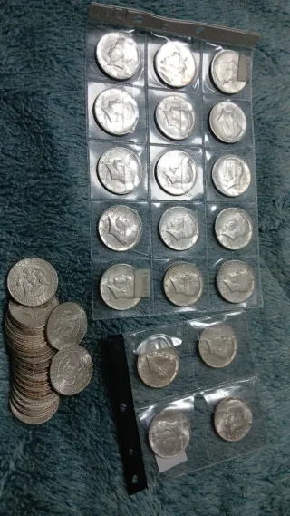 10 monedas de  medios dolares de plata 900 año1964