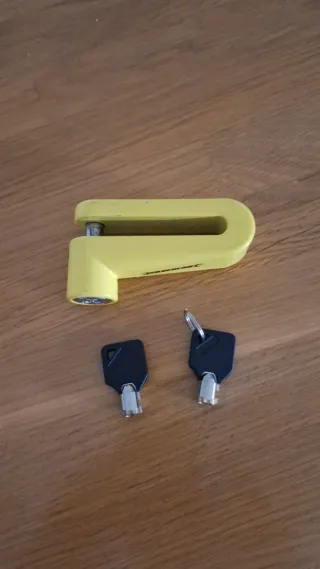 Candado de disco amarillo para moto. Nuevo