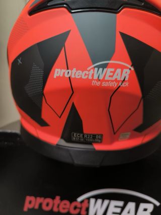 Casco de moto Protectwear naranja y negro