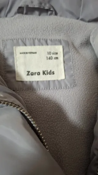 Plumífero niña capucha gris plata