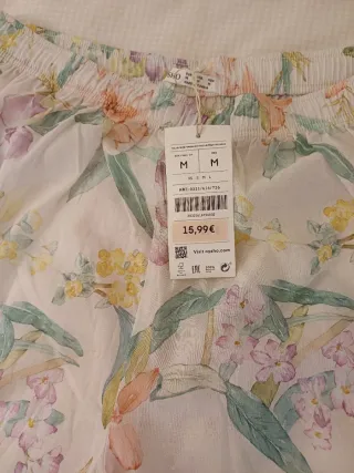 Pantalón corto OYSHO floral 100% algodón