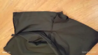 Saia preta com renda na bainha