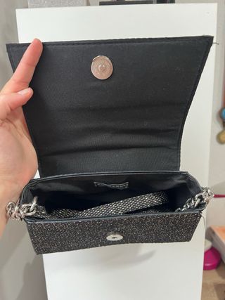 Bolso de mano con tira larga