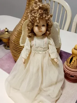 Muñeca de porcelana vintage